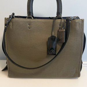 Authentic olive green coach rogue 30